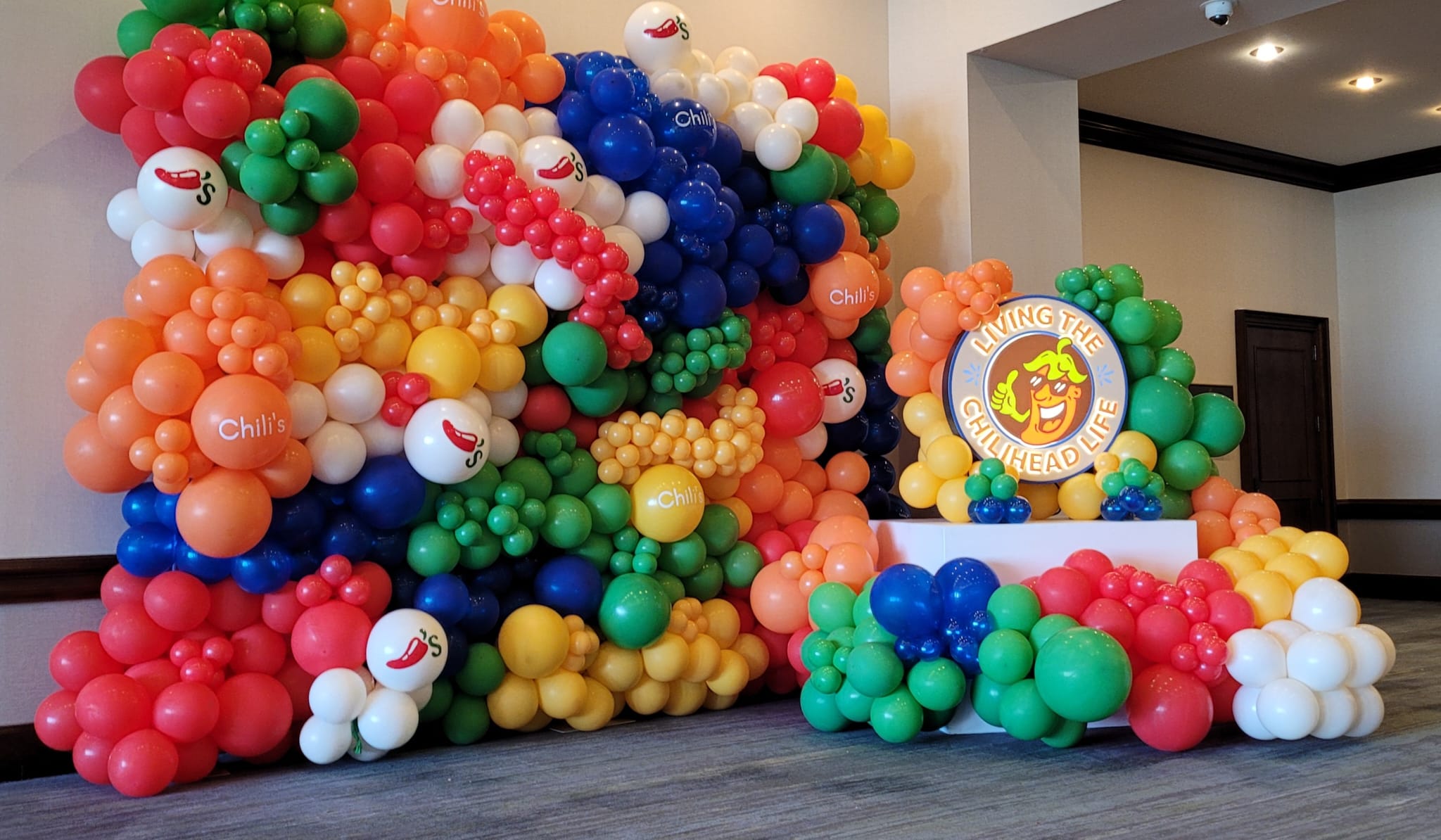 A sophisticated balloon wall designed for corporate events, showcasing professionalism and creativity in event planning