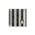Black and white striped fabric with a small logo in the corner